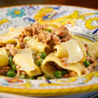 Calamarata Pasta with Sausage, Tomatoes and Ricotta