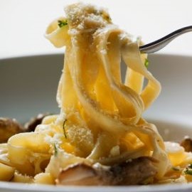 Golden Egg Pappardelle with Sausage and Sun-Dried Tomatoes